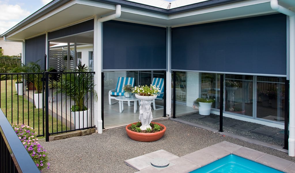 outdoor awnings over a pool area