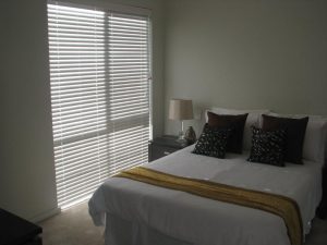 venetian blinds in a bedroom